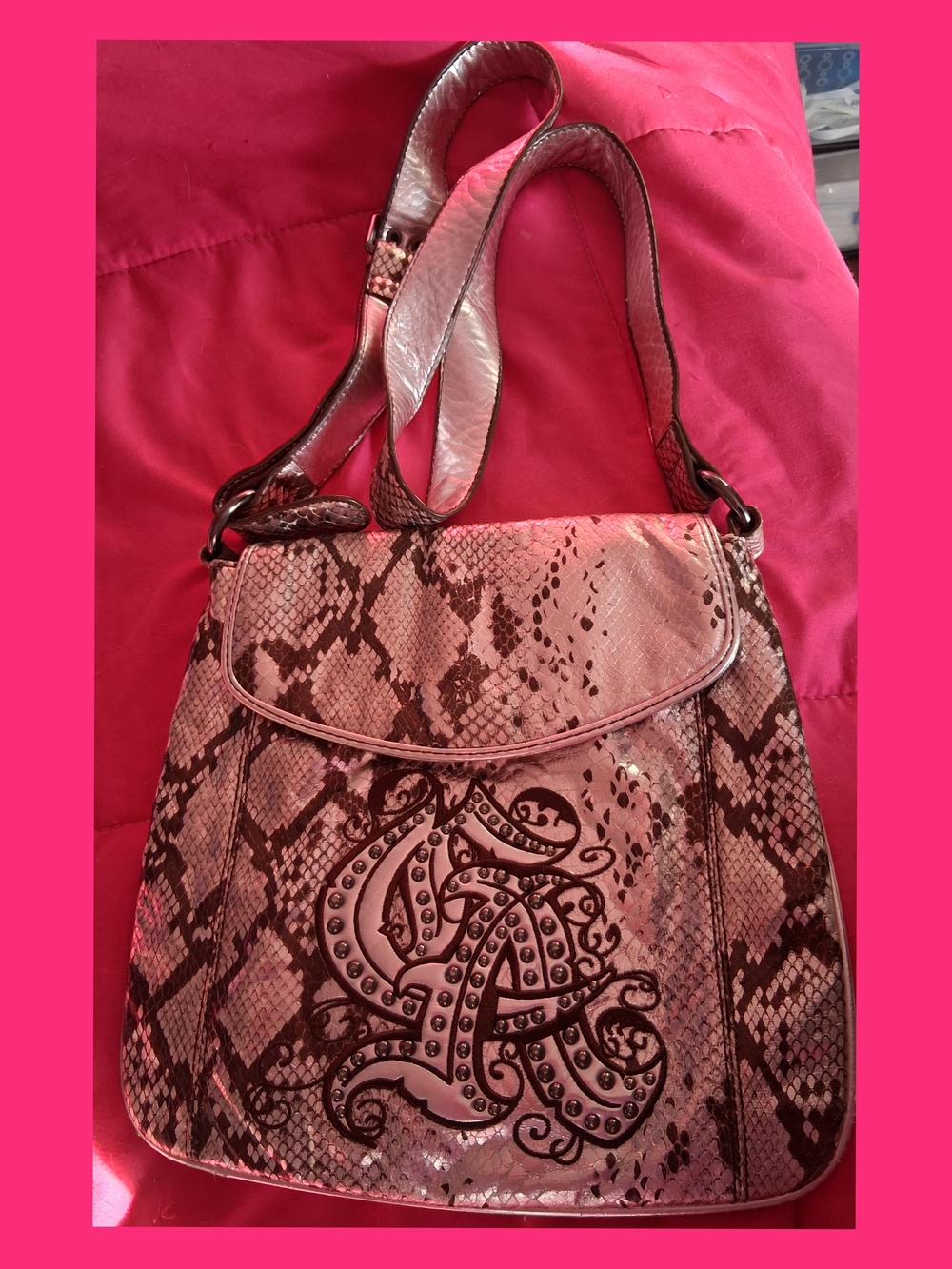Snake-Print Pink Shoulder Bag with Decorative Embellishment